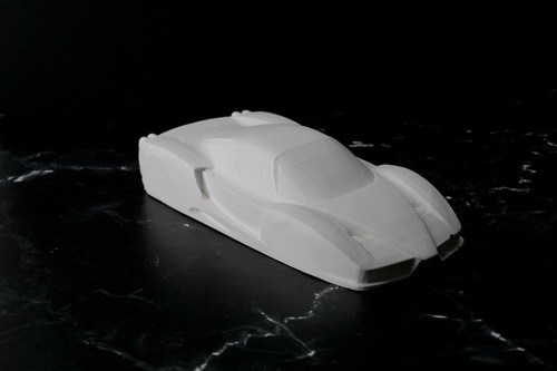 Scultura cemento ferrari - cemento,