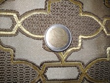 rara moneta da 2 euro portogallo 2002, errore di conio.