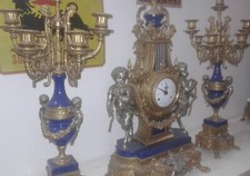 Orologio trittico con due candelabri