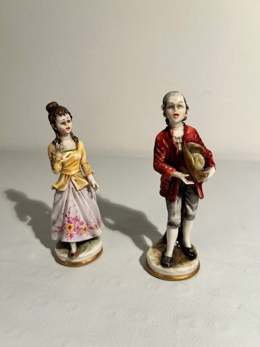 Coppia statuine in - di,