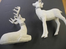 (2) Statuine renne rivestite