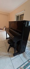 vendo pianoforte Schulze Pollman nero con ovale in radica di noce. Mecc. Renner