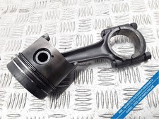 Engine piston with connecting