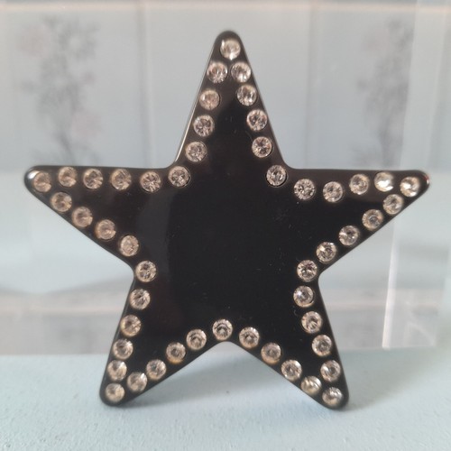 Spilla stella con - a,