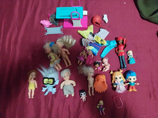 blocco di mini bambole e bambolotti