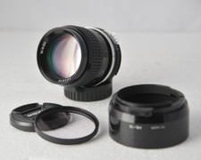 OBIETTIVO NIKON NIKKOR 85 MM F. 2 AI CON PARALUCE HS-10 E FILTRO UV COME NUOVO