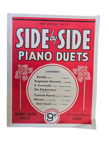 Vintage sheet music side - side, by