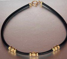 Bracciale caucciù con - caucciù,