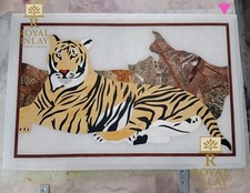 Tavolo intarsiato marmo tigre