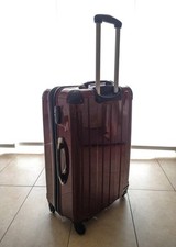 Trolley rigido Carpisa L rosso + coprivaligia – come nuovo