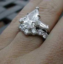 SET FEDE NUZIALE 3,87 CT PERA