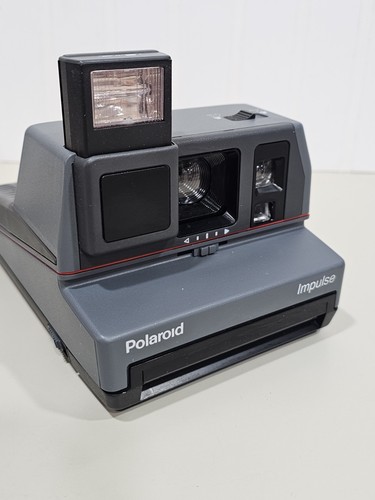 Polaroid impulse 600 camera - polaroid,