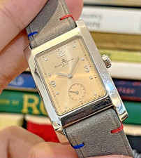 Raro quadrante salmone Baume