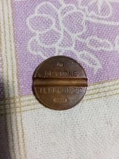 Gettone Telefonico 7711