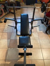 panca multifunzione con bilanciere e pesi