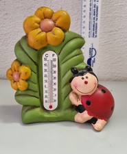 statuina simil thun termometro con coccinelle e fiori 