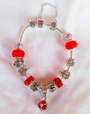 BRACCIALE DONNA CON CHARMS -