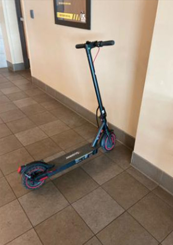 Electric scooter has box - has,