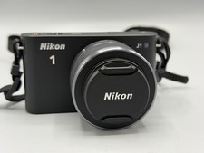 Nikon 1 J1 con obiettivo
