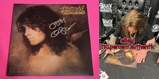 OZZY OSBOURNE FIRMATO