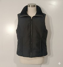 ​Gilet Sisley, Smanicato