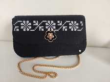 Pochette in rete canvas ricamata a mano