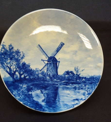 Piatto delft con paesaggio - di,