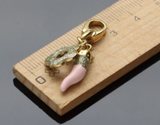 750/1000.18KT ROSE GOLD CHARMS