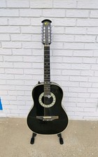 Chitarra elettrica acustica