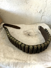 Cartucciera fucile anticoCartucciera antica con cinghia e cartucce