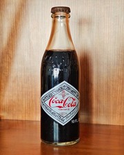 Coca Cola vintage rara Bottiglia Anniversario 50 ANNI 1927 1977 integra e piena