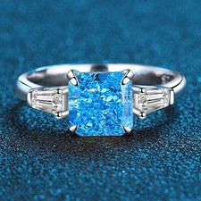 Anello a tre pietre con