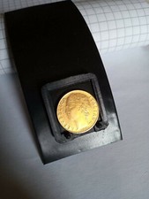 Moneta di 100 lire minerva del 1991 in metallo giallo oro