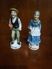 Coppia di Statuine Ceramica Vecchietti con cesto 
