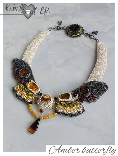 Collana farfalla ambra - in,