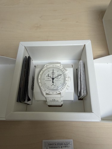 Swatch omega speedmaster - swatch, vs