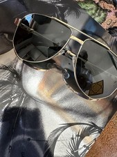 occhiali da sole uomo Cartier