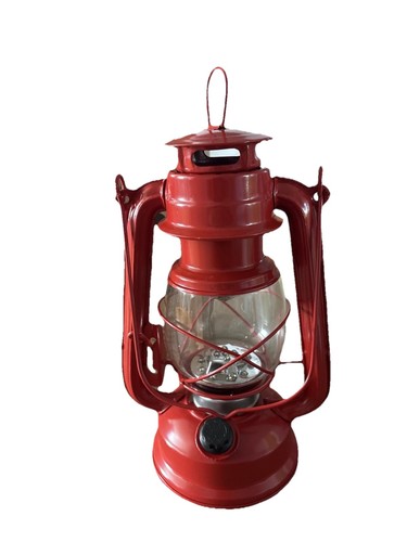 Red hurricane lantern with - hurricane,