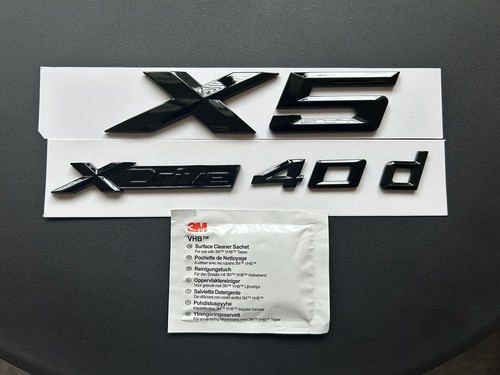 Bmw xdrive 40d - +, distintivo