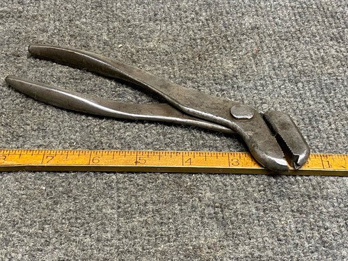 Antica pinza per - giunti, a