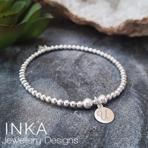 Bracciale iniziale in - u,