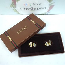 Gemelli Gucci ad incastro G