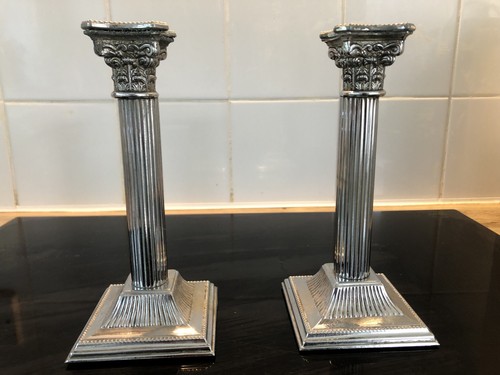 Coppia candelabri colonna