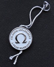 OMEGA - CO-AXIAL HANG TAG WATCH LABEL ETICHETTA  per OROLOGIO