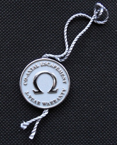 Omega axial hang tag - omega,