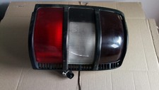 FANALE POSTERIORE DESTRO MITSUBISHI PAJERO ANNO 96 CON LEGGERA CREPA
