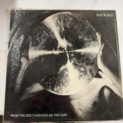 Bauhaus press the eject and - press,