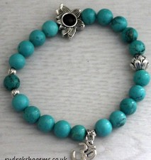 Bracciale In Cristallo Turchese Elasticizzato Con Charm E Perline Regalo