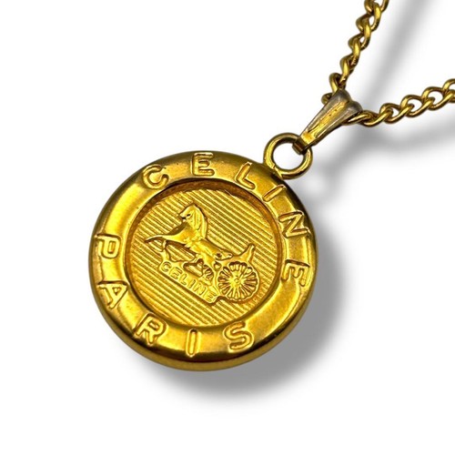 Collana tono oro con - , ciondolo