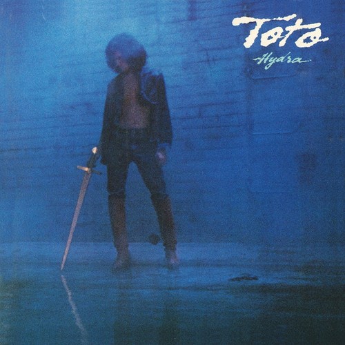 Copertina album musicale toto - musicale,